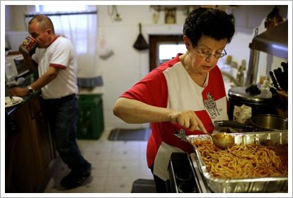 Jorge Munoz and his family help prepare meals each day to the hungry in Queens, NY.