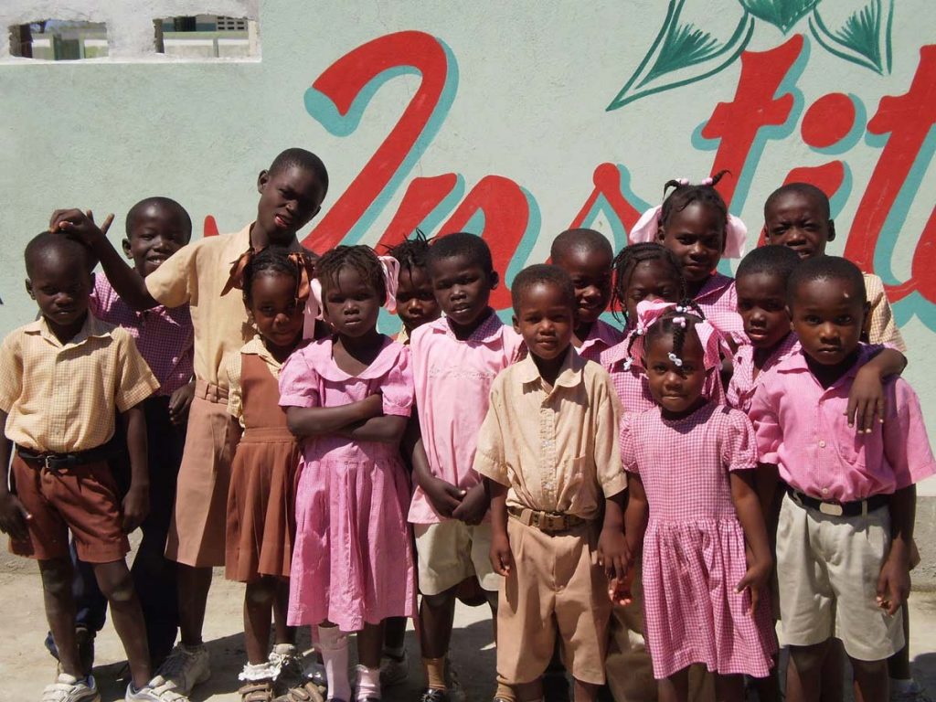 Students outside Institution Mahanaim High School in Grande Saline, Haiti