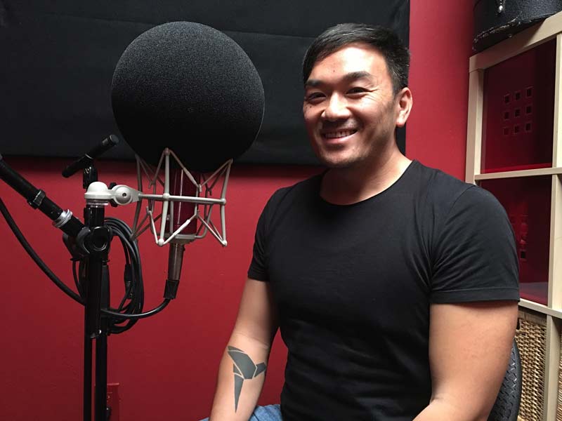 Toan Lam in a podcast studio