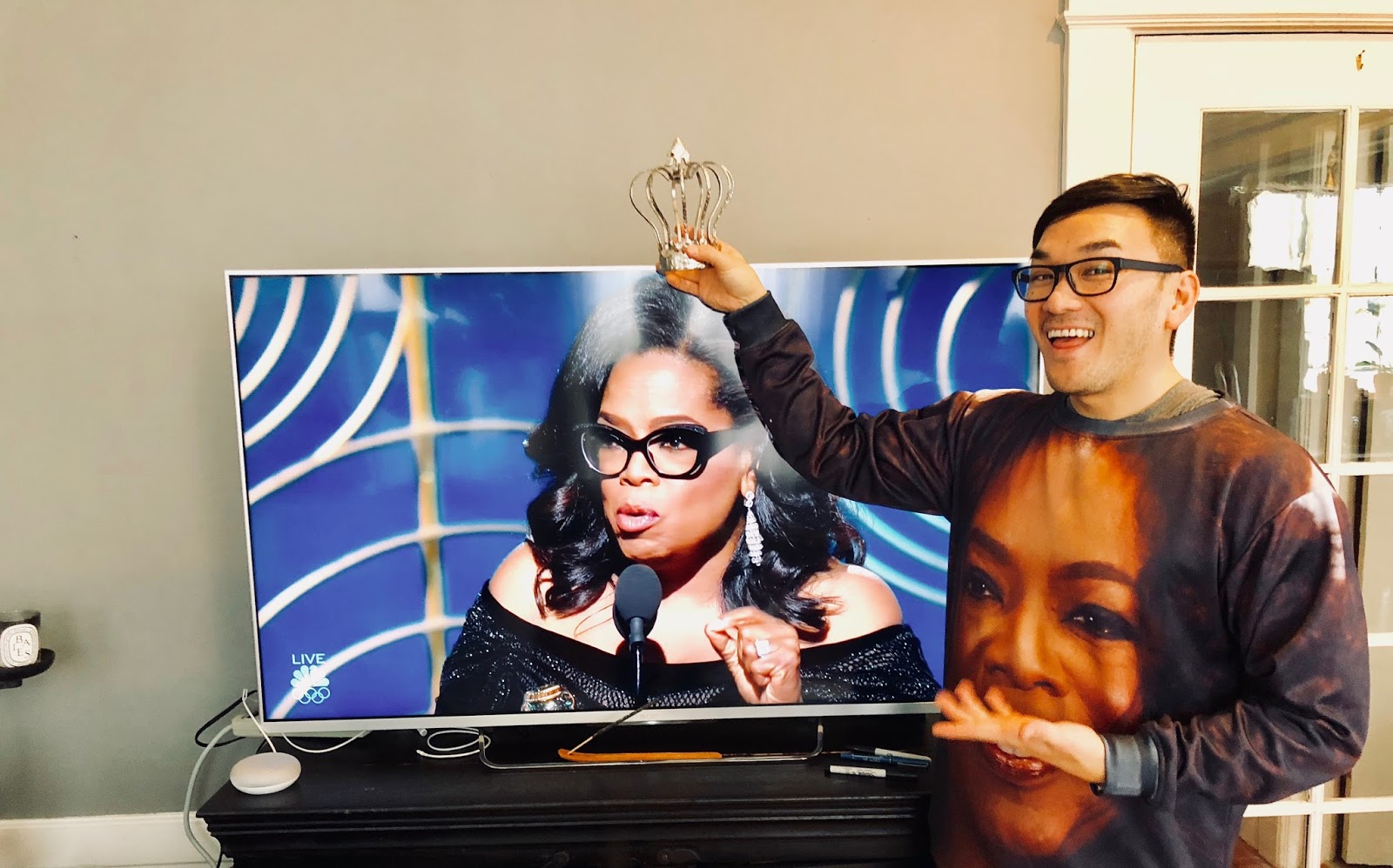 Oprah Winfrey with a crown from Toan Lam