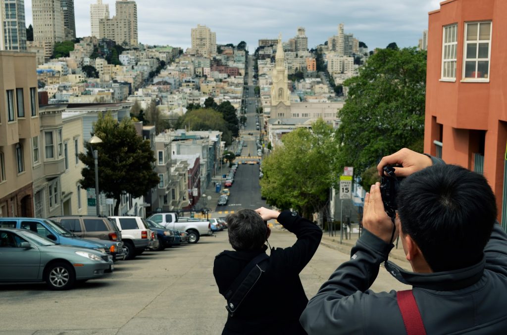 Kat Sloma and Toan Lam taking photos of San Francisco